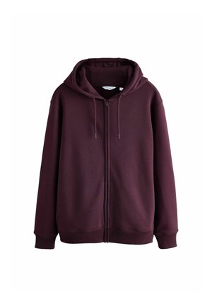 Bordo zip-up džemperis su gobtuvu, pagamintas iš minkštos medžiagos. Pasižymi priekiniais užtrauktukais, šoninėmis kišenėmis ir susiraukšlėjusiomis rankogaliais bei apvadu.