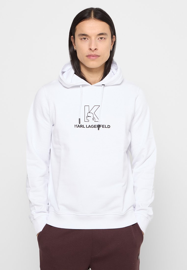 Sudadera de algodón blanca con cordón ajustable, que presenta un gráfico impreso en negro con las palabras "K" y "KARL LAGERFELD" en el frente. Diseño simple.