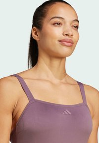 adidas Sportswear ICONISEA PADDED U-BACK - Swimsuit - shadow fig   white