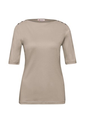 Top beige da donna a maniche corte con scollo a barca e dettagli con bottoni argento sulle cuciture delle spalle.