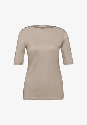 Beige kortærmet damebluse med bådformet halsudskæring og sølvknapdetaljer på skuldersømmene.