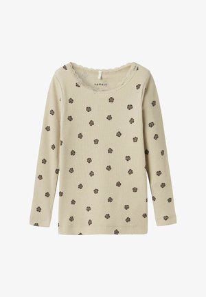 Lichtbeige langarmshirt met ribbelstructuur, voorzien van kleine bruine bloemmotieven en een ronde hals met kantafwerking.