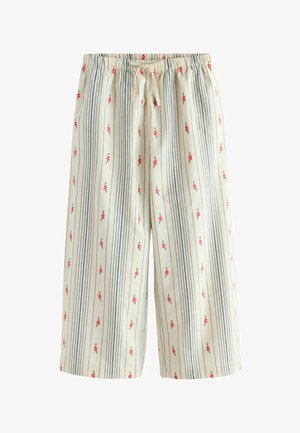 Pantaloni a gamba larga color crema con righe verticali blu navy e piccoli motivi floreali rossi, con vita elasticizzata e coulisse.