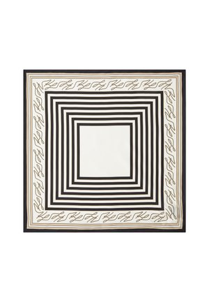 Foulard carré avec des rayures concentriques noires et blanches et une bordure beige ornée d'un motif répétitif en écriture cursive.