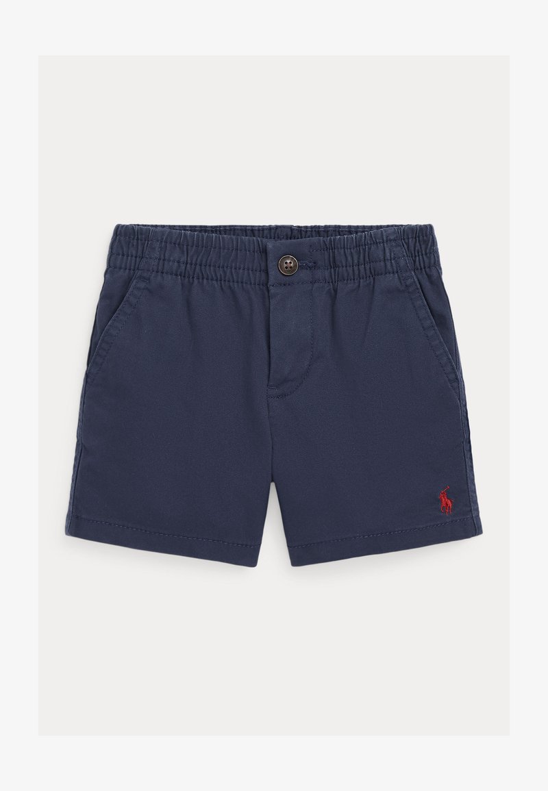 Navy modré plavky z lehkého materiálu. Obsahují elastický pás s knoflíkem, boční kapsy a vyšitý červený logo.