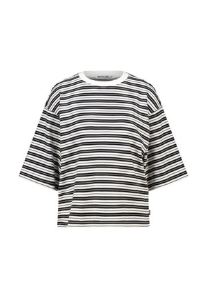 White oversized short-sleeve top with black horizontal thin stripes and a round neckline, labeled "America Today" inside the collar.