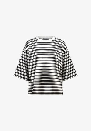 White oversized short-sleeve top with black horizontal thin stripes and a round neckline, labeled "America Today" inside the collar.