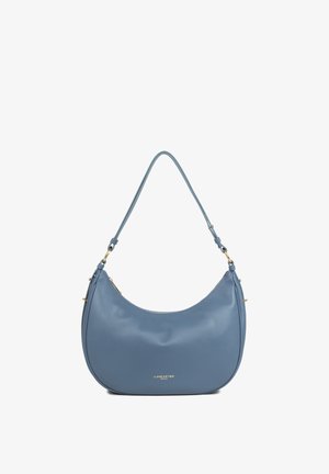 Blauwe leren schoudertas in halvemaanvorm met verstelbare riem en klein gouden "Lancaster Paris" logo aan de voorkant.