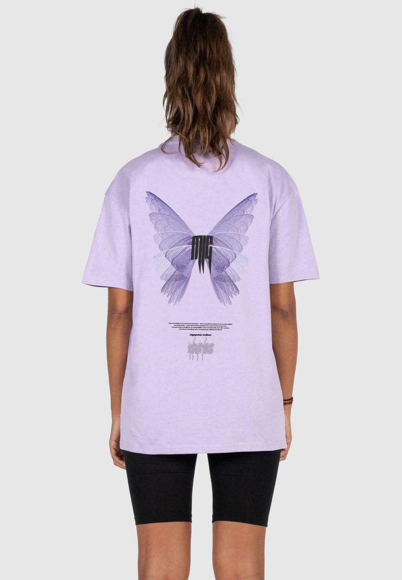 Purple cotton t-shirt featuring a large butterfly graphic and branding on the back. Short sleeves, relaxed fit, and plain front.