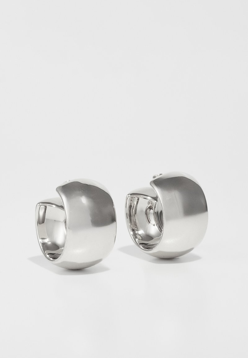 Uncommon Matters SCULPTURAL LARGE CREOLE - Σκουλαρίκια - silver-coloured