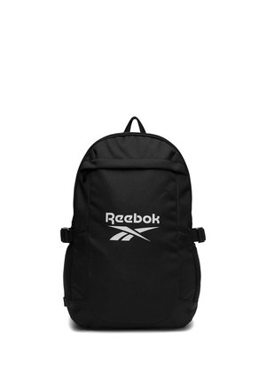 Schwarzer Reebok-Rucksack mit vorderer Reißverschlusstasche, seitlichen Netzfächern, verstellbaren Trägern und weißem Reebok-Logo auf der Vorderseite.