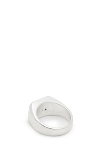 Silver signet ring with a flat, angular top and smooth, rounded band; polished surface with a slight sheen.