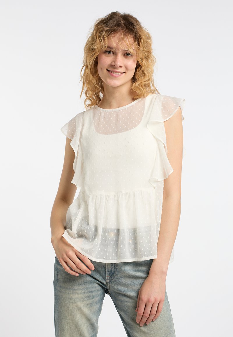Leichte weiße Bluse mit gerafften Ärmeln, durchsichtigem gepunktetem Stoff und einem gestuften Design. Sie hat eine taillierte Taille und einen runden Ausschnitt.