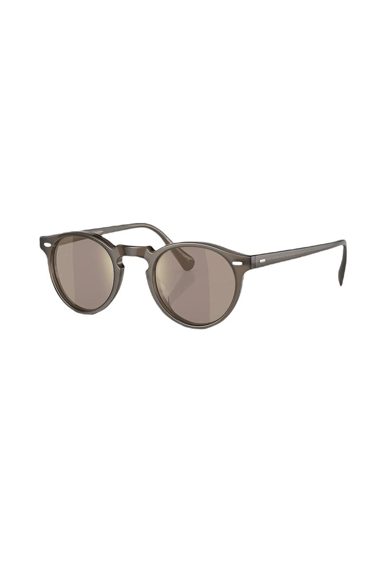 Occhiali da sole rotondi con una sottile montatura grigia opaca e lenti colorate. Presentano un design minimalista con accenti laterali discreti.