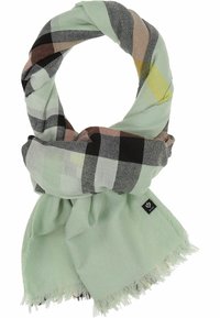 Bufanda de cuadros verde claro con acentos en negro, gris y tonos pastel. Tejido suave con flecos en los bordes, doblada en un diseño en bucle.