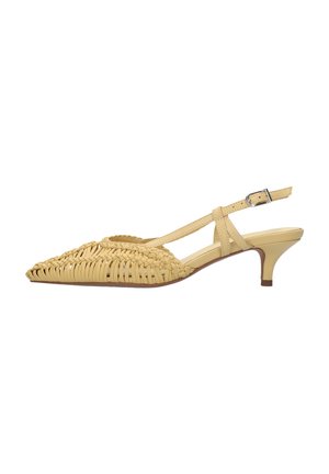Beige woven leather slingback shoe with pointed toe and low kitten heel, featuring an adjustable buckle strap.