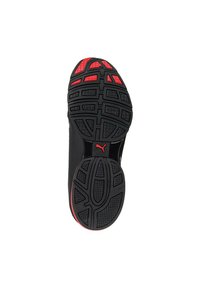 Black athletic shoe sole with red accents, textured rubber for grip, and a detailed tread pattern. Includes branding on the side.