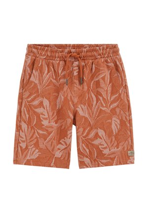 Shorts orange rouille avec motif léger de feuilles, taille élastique, cordon de serrage, poches latérales et petite étiquette en tissu sur l'ourlet.