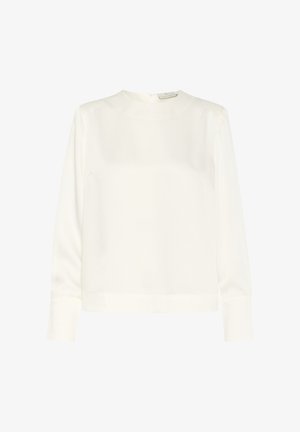 Blouse blanche à manches longues en tissu lisse avec un col montant et une fermeture éclair dans le dos. Présente une coupe décontractée et un ourlet droit.