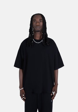 UNISEX - T-shirts - black