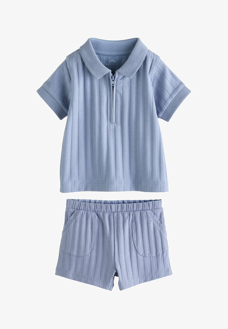 Light blue ribbed knit short-sleeve polo shirt with front zipper and matching elastic waist shorts with front pockets.