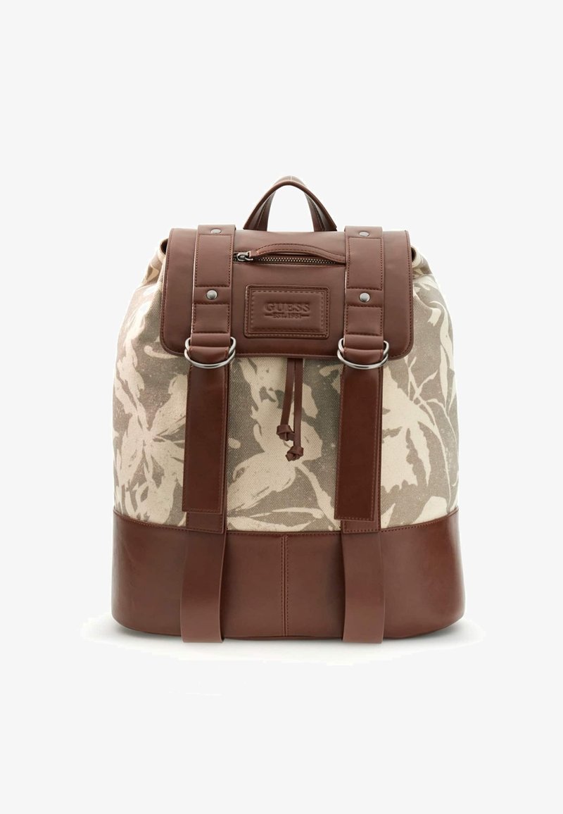 Σακίδιο με μπεζ υφασμάτινη επιφάνεια με λουλούδια, καφέ δερμάτινα λουριά και βάση, μπροστινή τσέπη με φερμουάρ και ετικέτα με το λογότυπο "Guess".