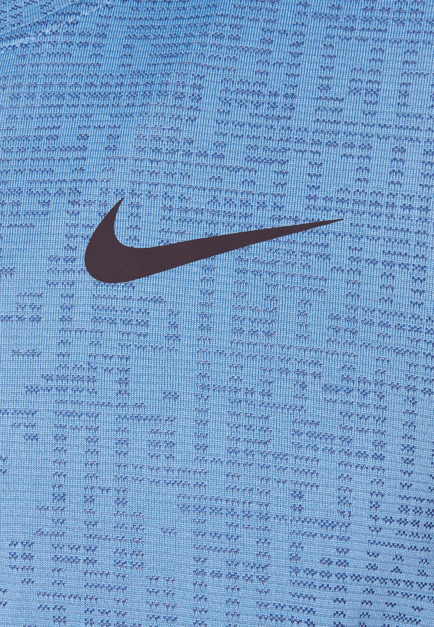 Nike Performance Basic T-shirt - coast/obsidian/black/light blue - Zalando .co.uk