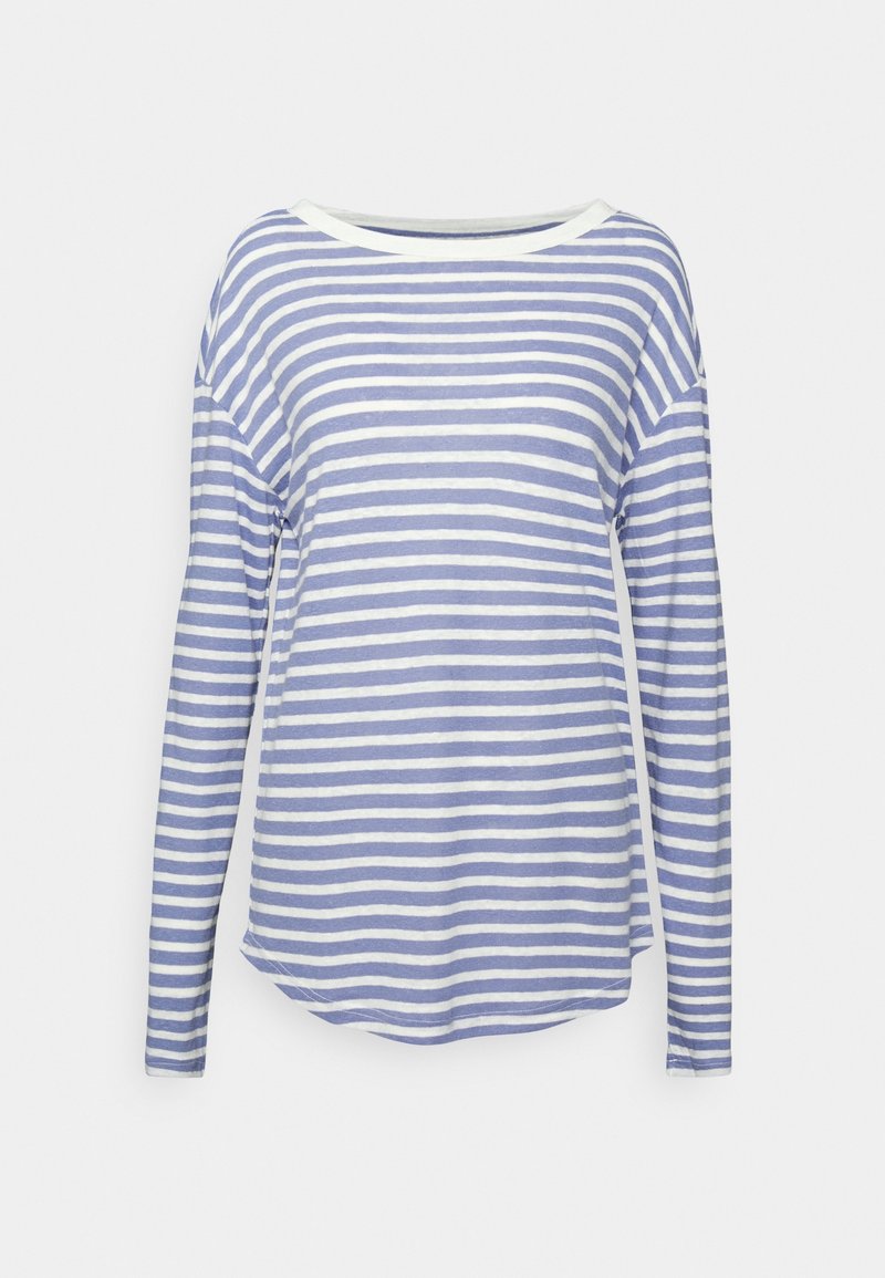 Raidallinen pitkähihaisuus yläosa vaaleansinisestä ja valkoisesta puuvillasta. Ominaisuuksiin kuuluu leveä kaula-aukko ja kaareva helma, jossa on sivuhalkiot. Pehmeä pinta ja rento mitoitus.