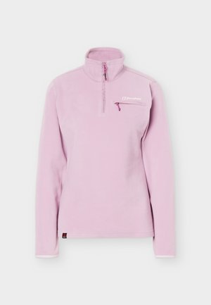 Pull polaire rose clair à manches longues avec fermeture éclair quart, col montant et poche poitrine zippée sur fond uni.