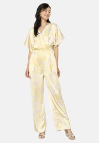 WITH FLUTTER SLEEVES - Pajac - yellow pastel