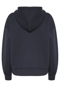 Mörk marinblå huvtröja med mjuk textur, oversized passform, ribbade manschetter och en känguruficka framtill. Släta sömsömmar.