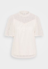 Blouse blanche en dentelle à manches courtes avec col montant, empiècement et manches en dentelle transparente, fermeture à bouton à l'arrière.