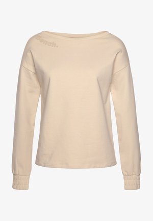 Beige long-sleeve top with a wide neckline, gathered cuffs, and embossed "Bench." logo on the shoulder. Smooth cotton blend fabric.