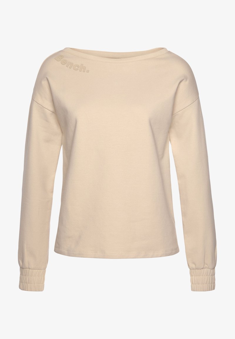 Beige long-sleeve top with a wide neckline, gathered cuffs, and embossed "Bench." logo on the shoulder. Smooth cotton blend fabric.
