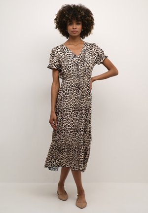 Leopardenmuster Sommerkleid in mittellanger Form mit V-Ausschnitt, kurzen Ärmeln und elastischem Bund. Verfügt über einen gestuften Rock und eine weiche Stofftextur.