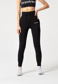 Carpatree BELLE - Verryttelyhousut - black