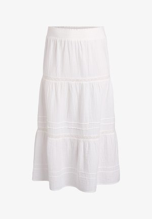 Jupe midi blanche à volants avec taille élastique et délicats détails de dentelle horizontale.