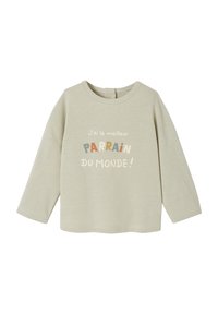 Hellbeige Langarmshirt aus weicher Baumwolle. Mit buntem Text: „J'ai le meilleur PARRAIN du monde!“ auf der Vorderseite in verschiedenen Schriftarten.