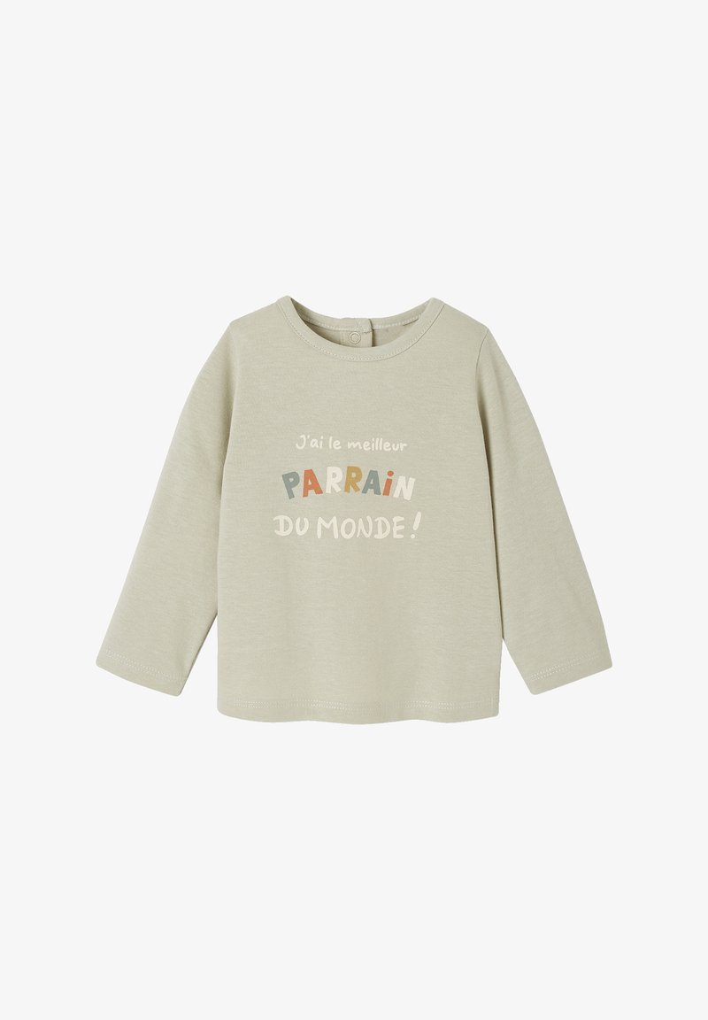 Light beige long-sleeve shirt in soft cotton. Features colorful text: “J’ai le meilleur PARRAIN du monde!” on the front in varied fonts.