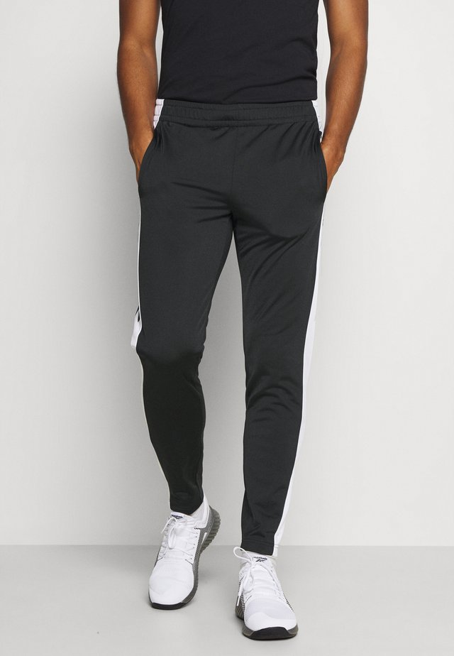 VECTOR TRACK PANT - Trainingsbroek - black
