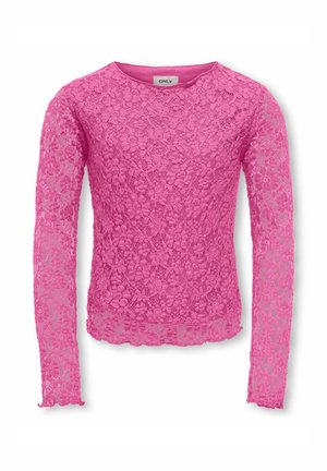 Blouse en dentelle rose à manches longues avec motif floral, col rond et bords festonnés aux poignets et à l'ourlet.