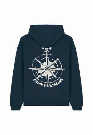 Marineblauwe hoodie met een voorkentas, voorzien van een witte geborduurde kompasontwerp en de tekst "VOLG JE DROMEN" eronder.
