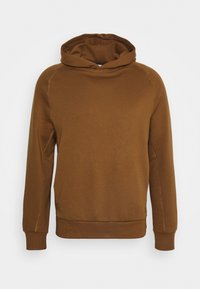 Sudadera marrón hecha de una tela suave, con una capucha grande, mangas largas y puños acanalados. Detalle de costura mínima en las costuras.