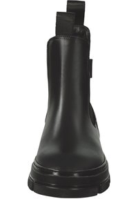 Black leather ankle boot with elastic side panels, rounded toe, and a chunky rubber sole. Features minimal stitching detail and tab for easy wear.