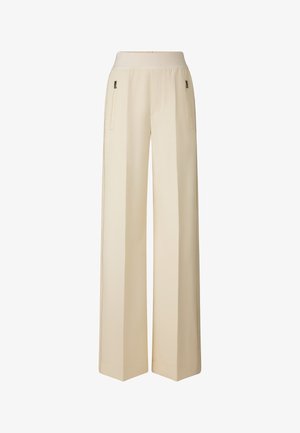 Wijde broekspijpen gemaakt van lichtgewicht beige stof, met een hoge tailleband en twee zijzakken met rits. Strak, minimalistisch ontwerp.