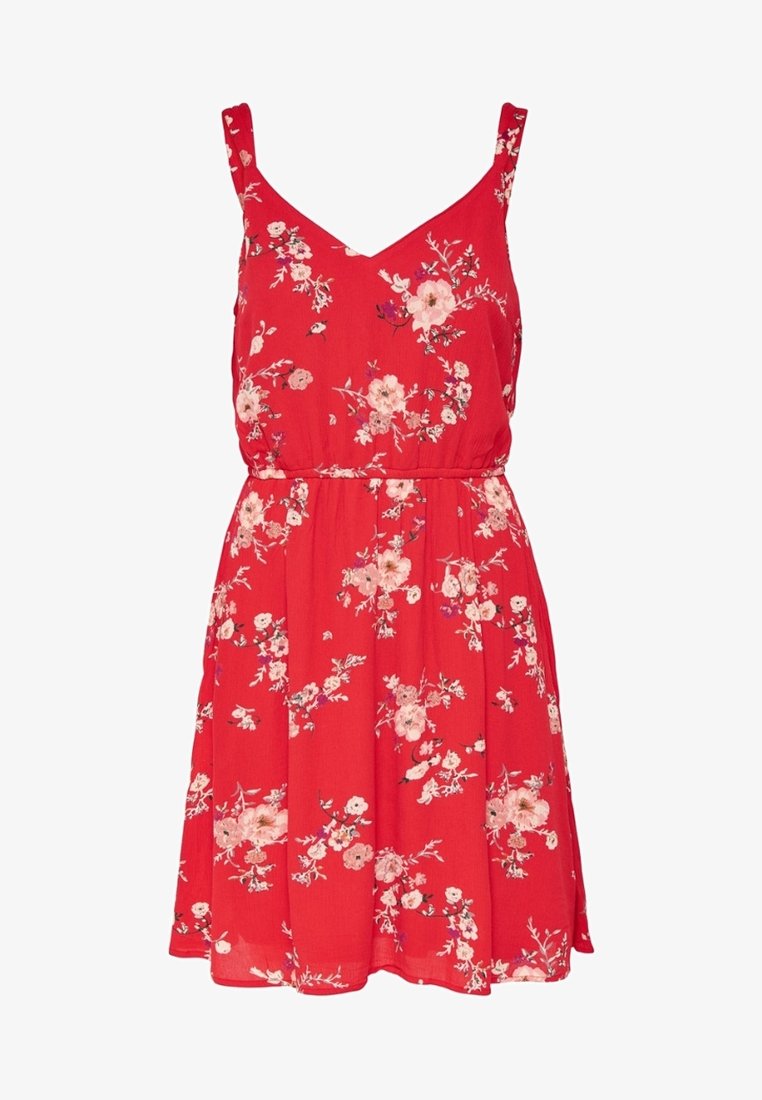 Robe sans manches rouge avec un motif floral rose et blanc, décolleté en V, taille cintrée et jupe fluide à mi-longueur.