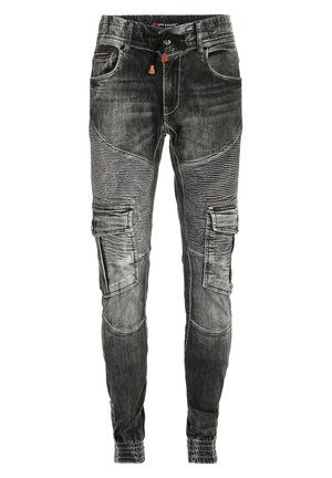 Black denim cargo pants featuring a slim fit, multiple pockets, textured paneling, and elastic cuffs. Accents include contrast stitching and a drawstring waist.
