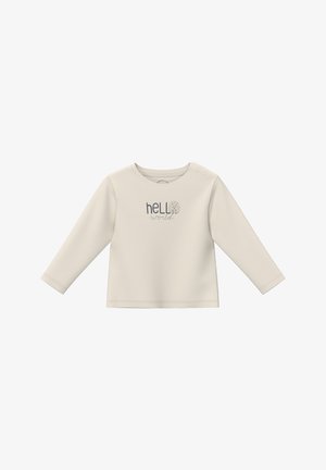 Langarm-Creme-Bluse mit rundem Ausschnitt, ausgestattet mit grauem Text, der "hello" über "world" abbildet, sowie Druckknöpfen an den Schultern für einfaches An- und Ausziehen.