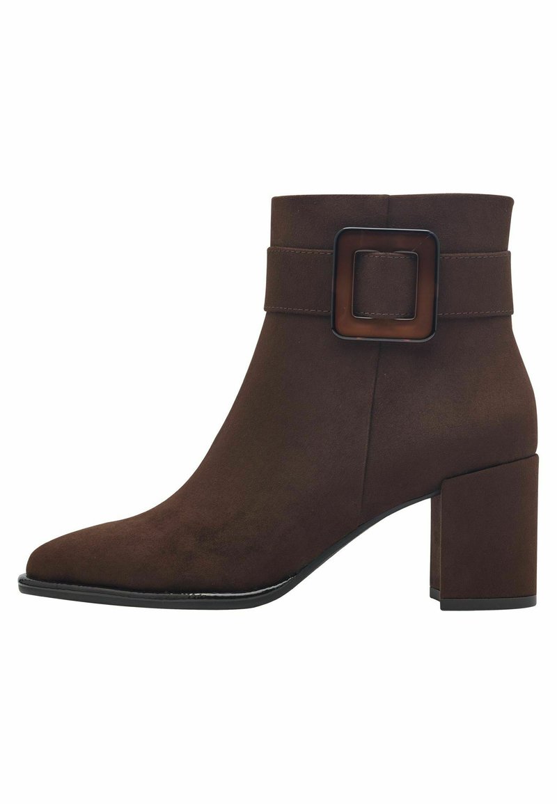Brown suede ankle boot with a block heel, square buckle detail, pointed toe, and smooth texture. Classic design suitable for various outfits.