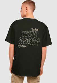 Merchcode CUPIDS ASSISTANT HEAVY TEE - T-shirts print - black